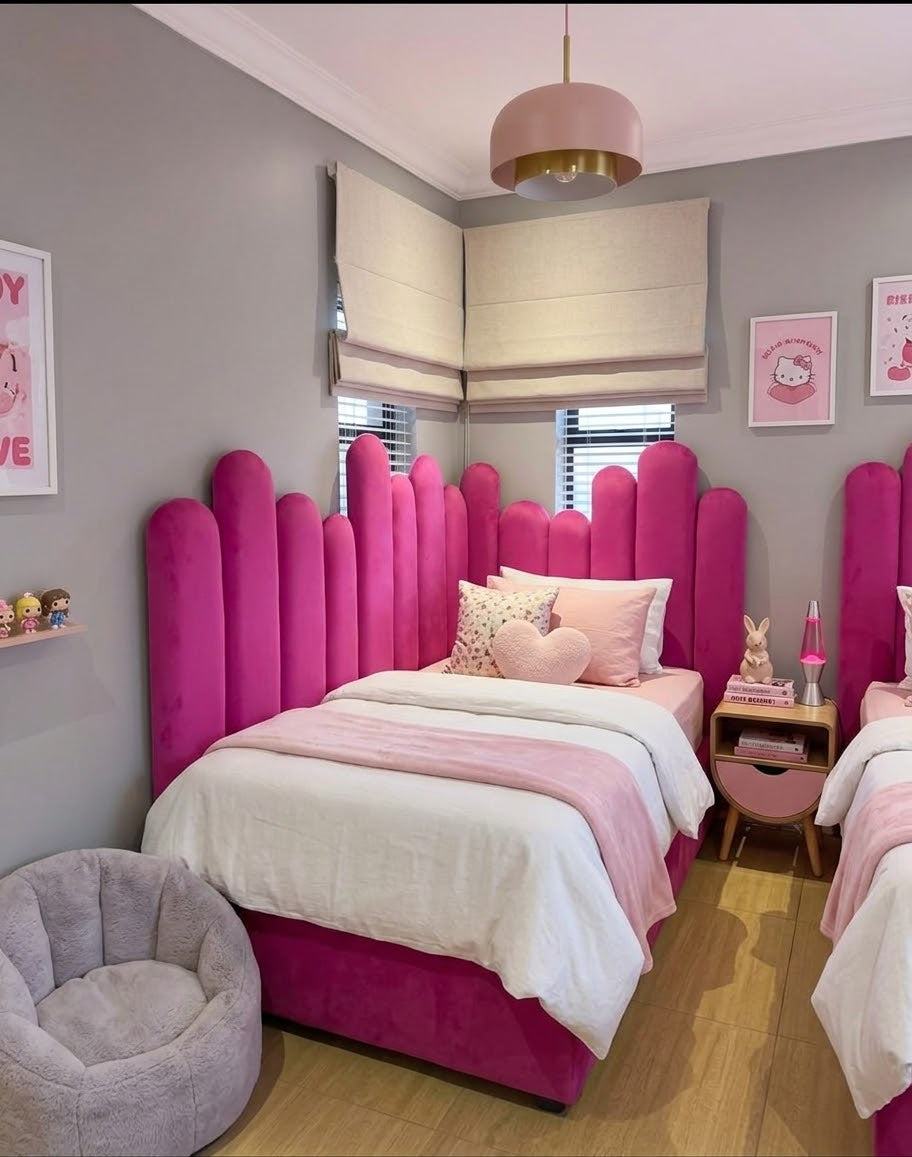 Kids Petal Headboard in fuchsia pink velvet with scalloped design in a girls bedroom