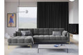 Slate grey velvet grid-tufted L-shape lounge with gold legs in a modern minimalist living room
